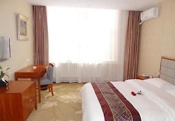 Yuangu Town Business Hotel Qingdao Exteriör bild